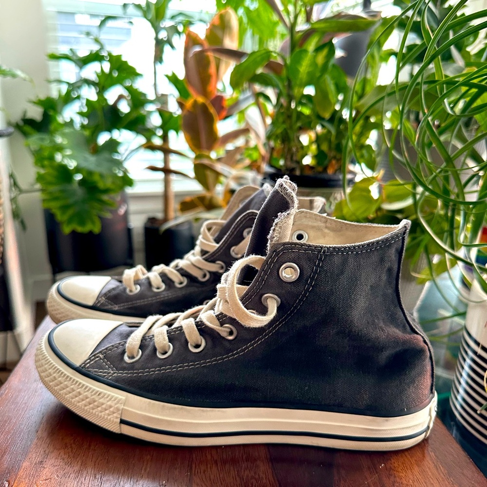 Slate gray high top converse all stars.